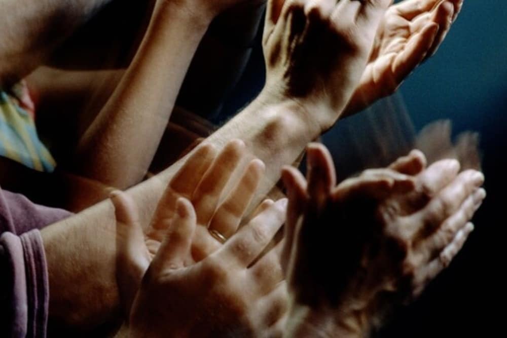 Hands clapping