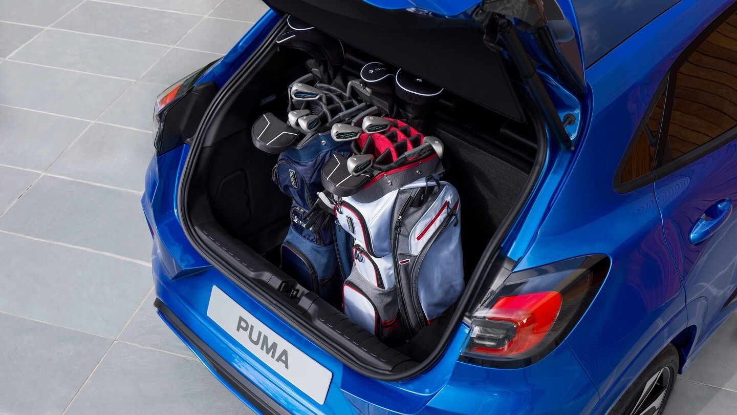 Ford Puma interior with golf clubs in loadspace