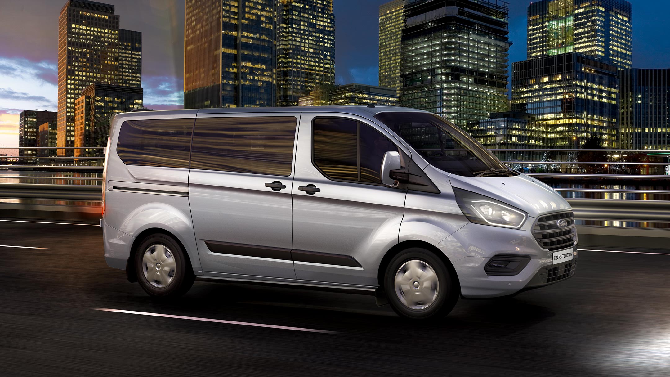 ew Silver Ford Transit Custom driving