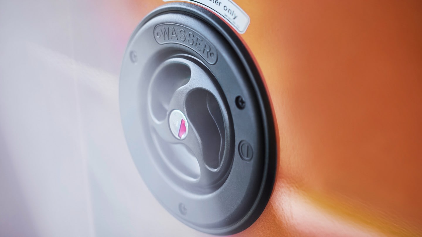 New Orange Ford Transit Custom Nugget close up of recharging point