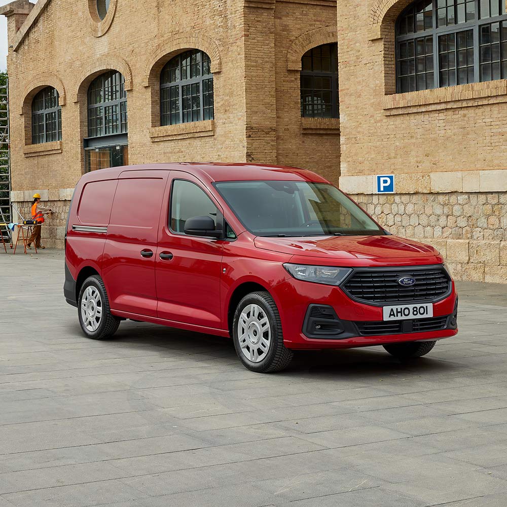 Ford Transit Connect Trend in Lava Red, mit Frontgrill und automatischen Scheinwerfern.