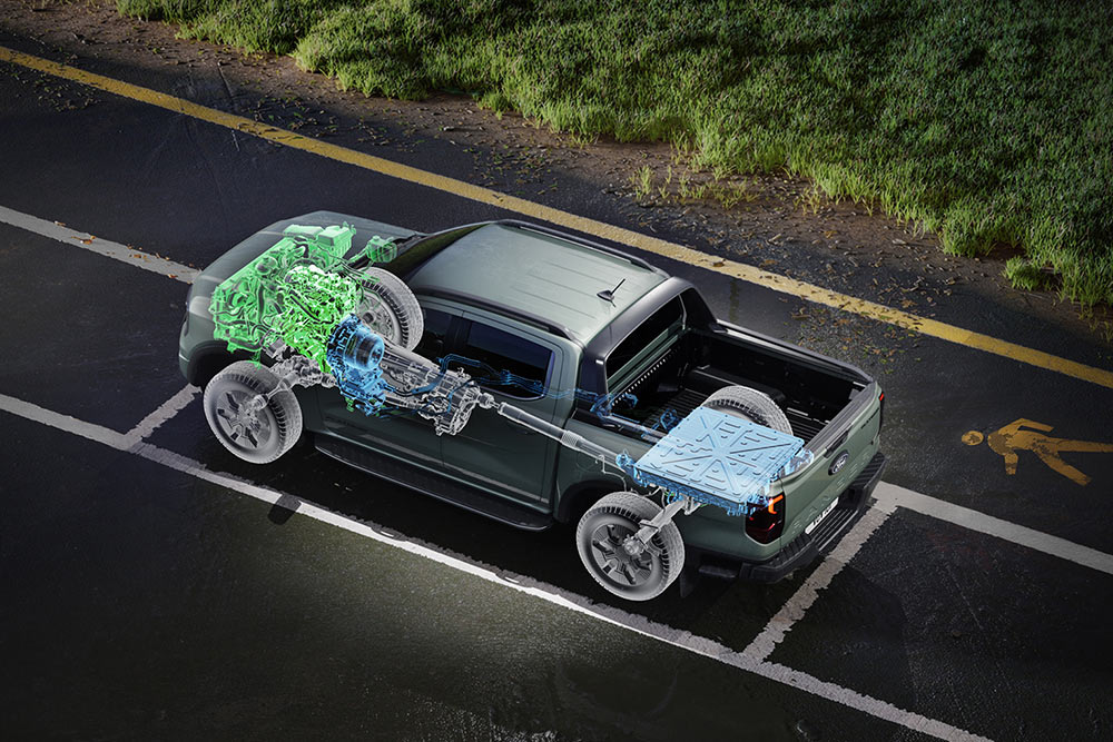 Ein Ford Ranger, der neben einer Wiese parkiert ist, mit einer grafisch aufbereiteten Innenansicht, die die Mechanik im Innenraum hervorhebt.
