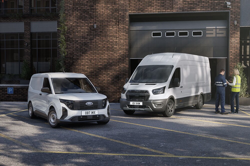 A small fleet including a white Ford Transit van and Transit Connect, parked outside a modern building.