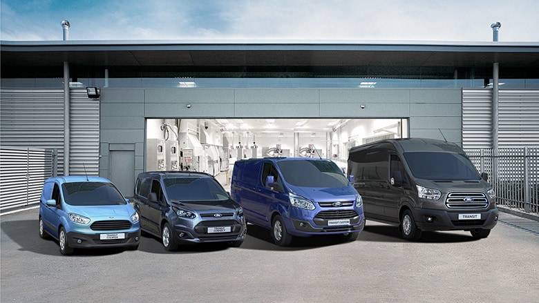Ford Transit range parked outside a garage